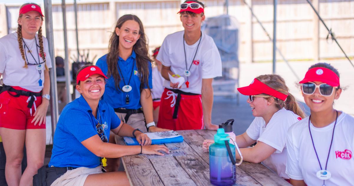 lifeguards at picnic table